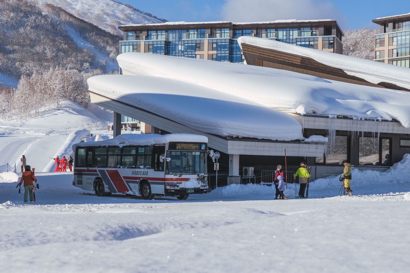 Shuttle bus collecting guests at the station